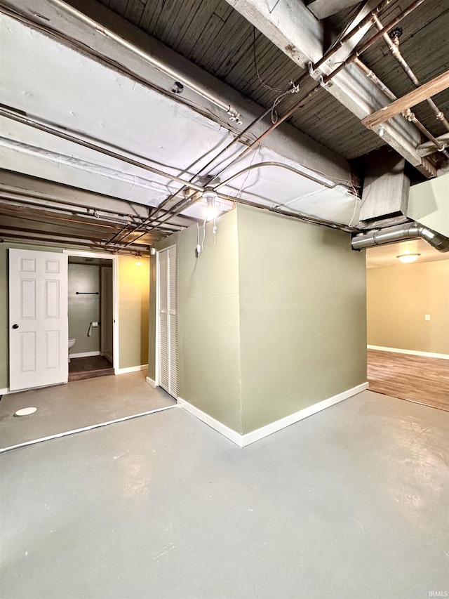 unfinished basement with baseboards