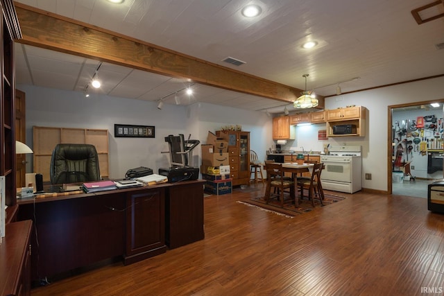 office with beam ceiling, dark wood-style flooring, visible vents, track lighting, and baseboards