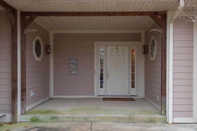 property entrance with covered porch