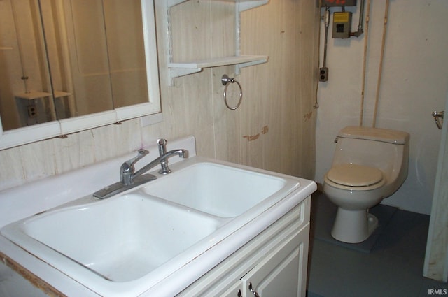 bathroom featuring vanity and toilet