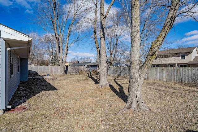 view of yard featuring a fenced backyard