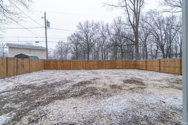 view of yard with a fenced backyard