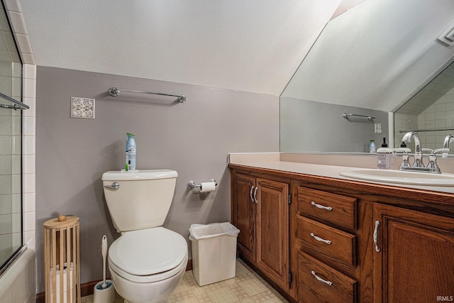 bathroom featuring lofted ceiling, vanity, toilet, and bath / shower combo with glass door