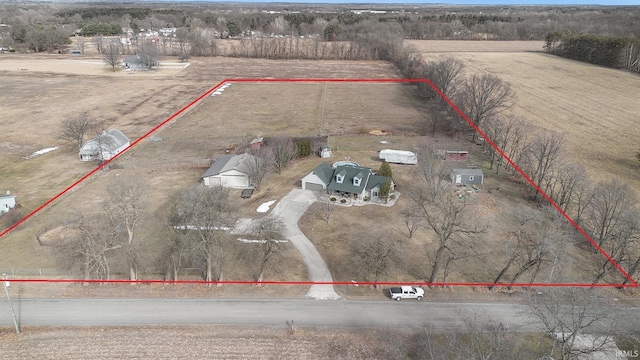 birds eye view of property featuring a rural view