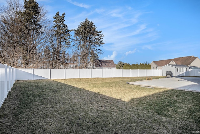 view of yard featuring a fenced backyard and a patio