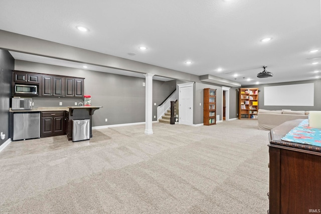 interior space featuring recessed lighting, light colored carpet, stairway, and baseboards