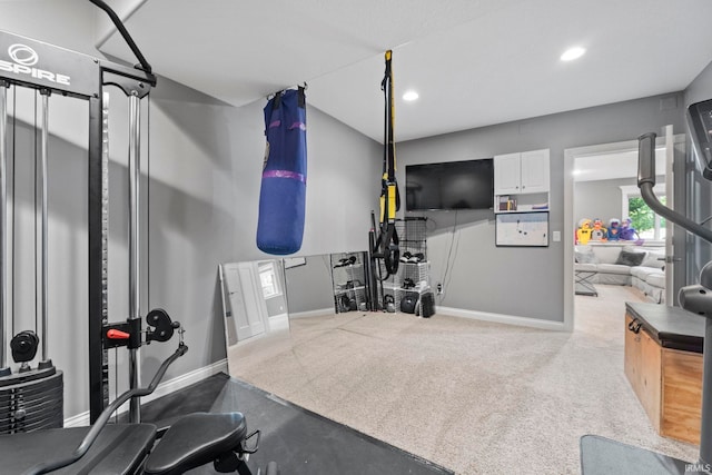 workout area with baseboards and recessed lighting