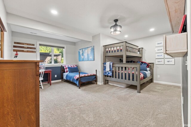 carpeted bedroom with recessed lighting and baseboards