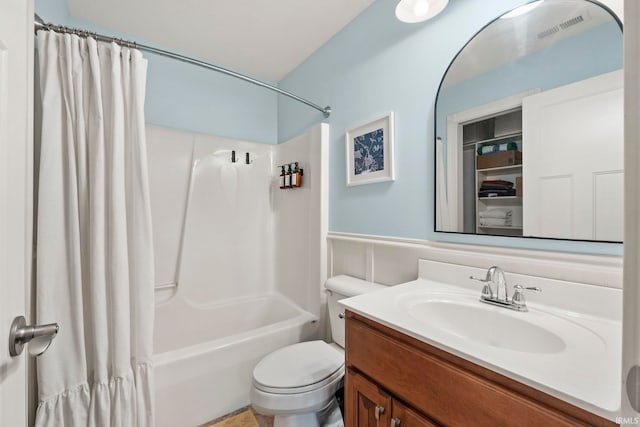 full bathroom with toilet, visible vents, shower / tub combo with curtain, and vanity