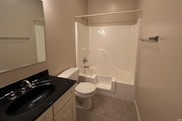 bathroom featuring toilet, tile patterned flooring, shower / tub combination, and vanity