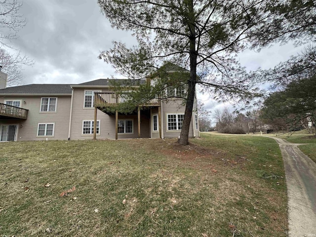 view of front of property with a chimney and a front yard