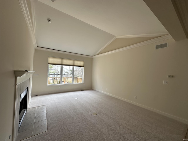 unfurnished living room with a fireplace, visible vents, baseboards, carpet, and crown molding