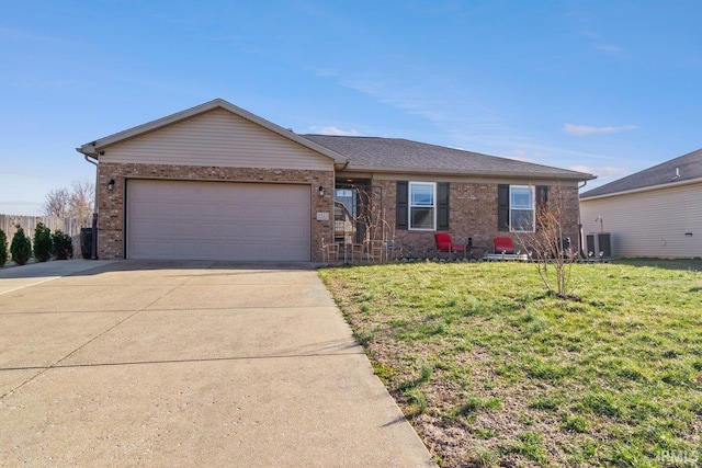 single story home with central AC unit, driveway, a front lawn, and a garage