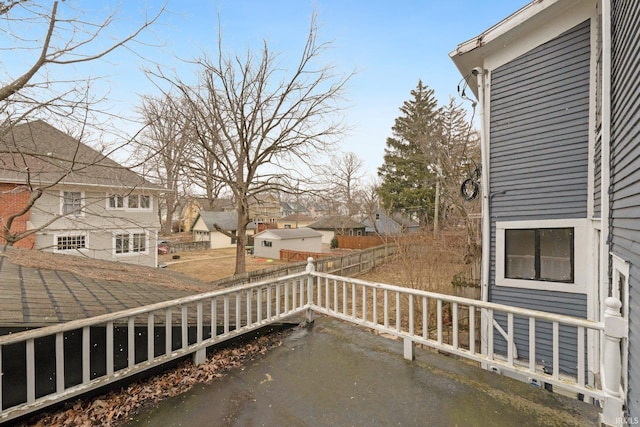 exterior space with a residential view and fence