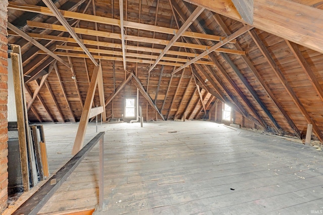 attic featuring an upstairs landing