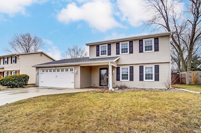 colonial-style house with an attached garage, fence, a front lawn, and concrete driveway