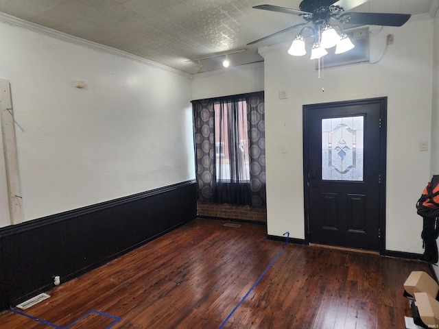 entryway with ornamental molding, wood-type flooring, visible vents, and plenty of natural light