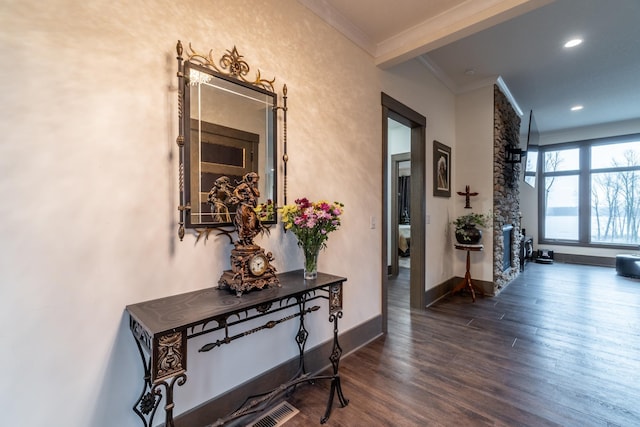 corridor with recessed lighting, baseboards, crown molding, and wood finished floors