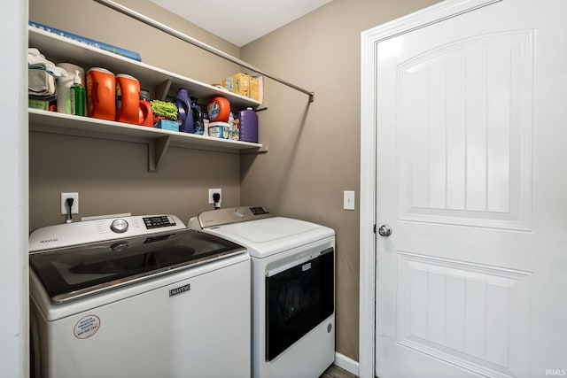 laundry area featuring laundry area and separate washer and dryer