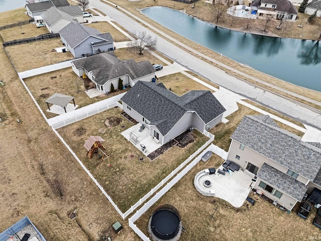 bird's eye view featuring a residential view and a water view