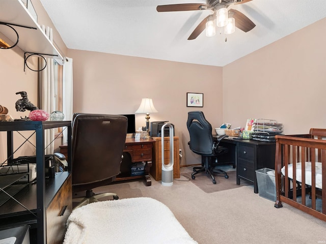 office with carpet floors and a ceiling fan