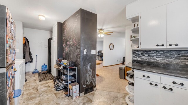 kitchen with decorative backsplash, white cabinetry, open shelves, and a ceiling fan