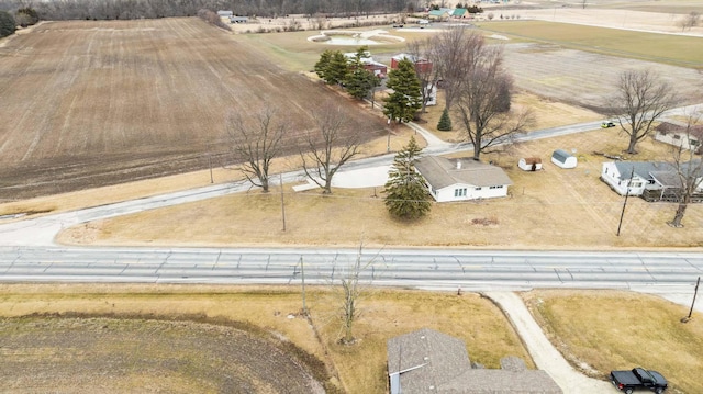 birds eye view of property featuring a rural view