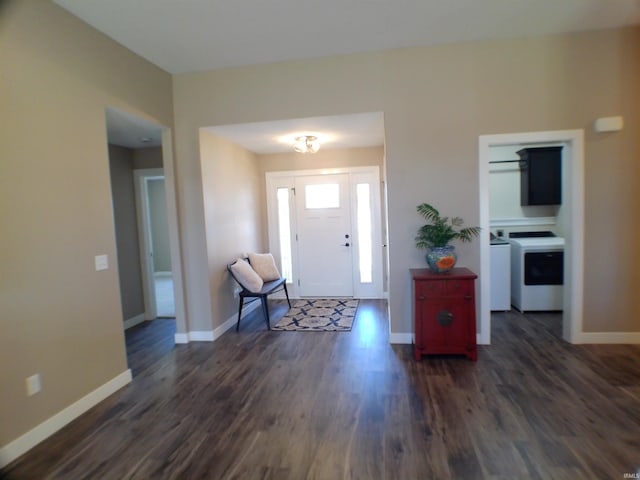 foyer entrance featuring dark wood-style flooring and baseboards