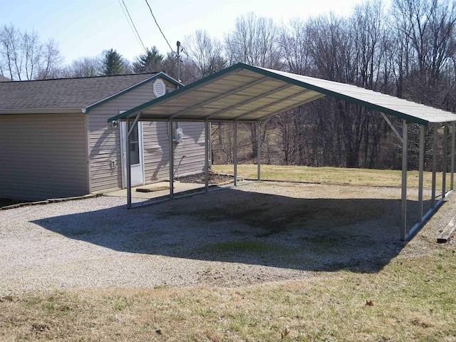 view of parking featuring a detached carport