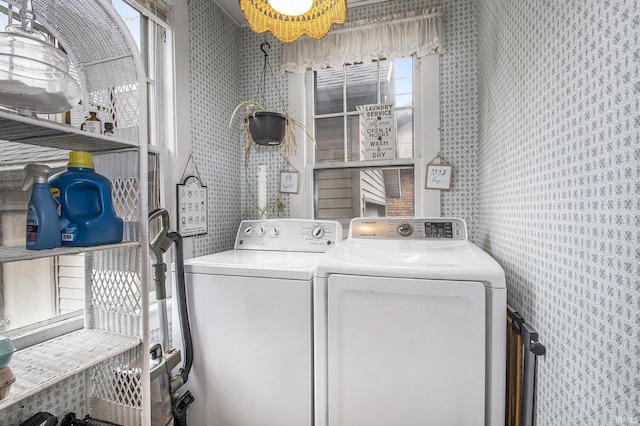 laundry room featuring laundry area and separate washer and dryer