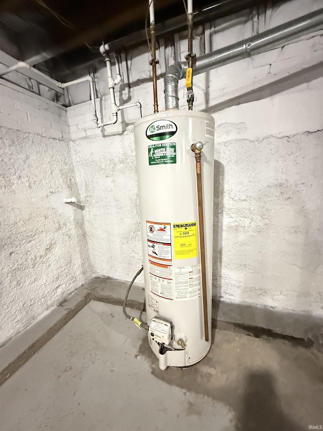 utility room with water heater