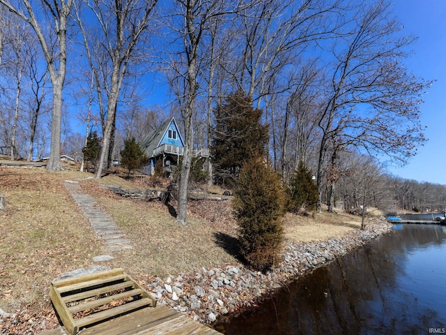 view of yard with a water view