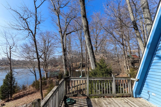 wooden terrace with a water view