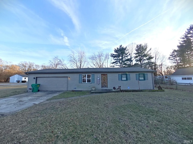 view of front of property with a garage, concrete driveway, and a front yard