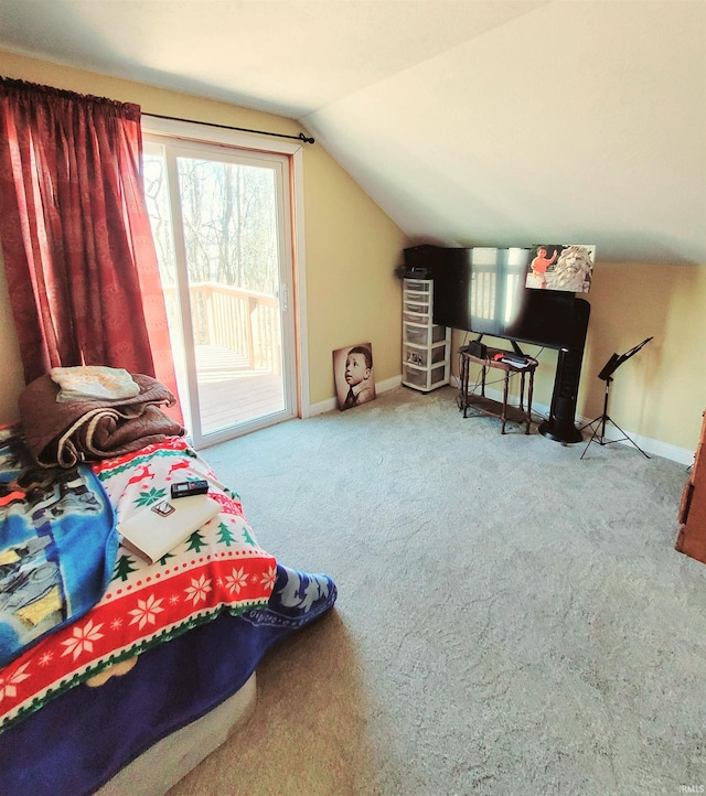 bedroom featuring vaulted ceiling, access to outside, carpet flooring, and baseboards