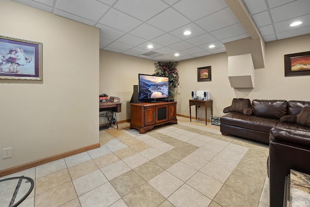 living area featuring recessed lighting, light tile patterned flooring, a paneled ceiling, and baseboards