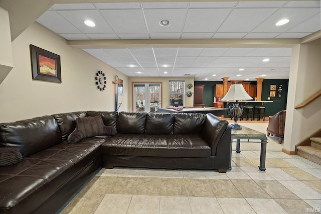 living area featuring light tile patterned floors, pool table, stairs, french doors, and recessed lighting