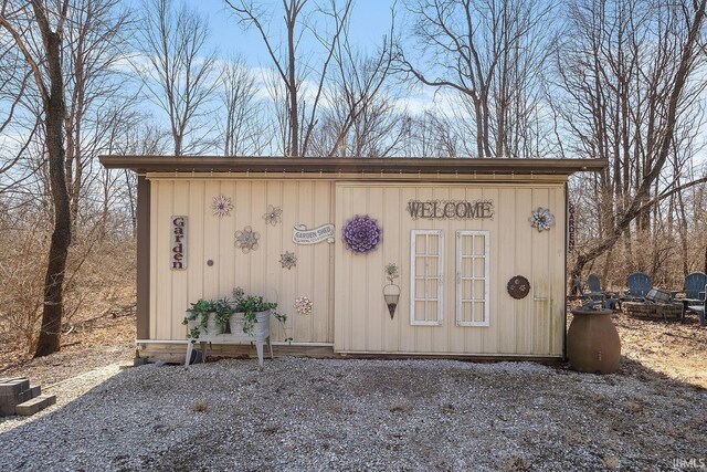 view of outbuilding with an outbuilding