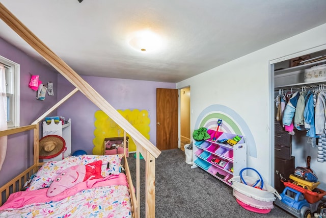 carpeted bedroom with a closet