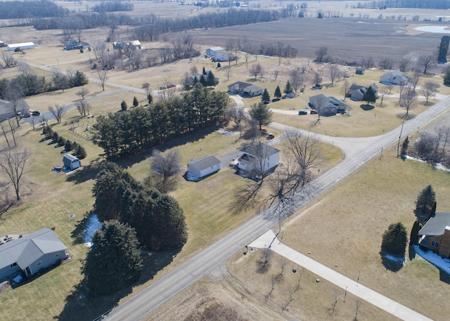 birds eye view of property featuring a rural view