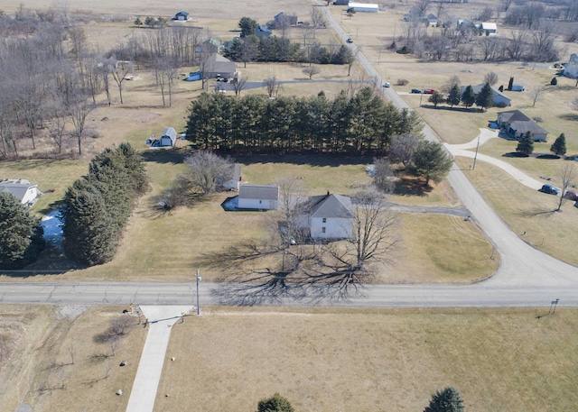 birds eye view of property with a rural view