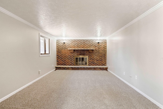 unfurnished living room with crown molding, carpet floors, a fireplace, and a textured ceiling