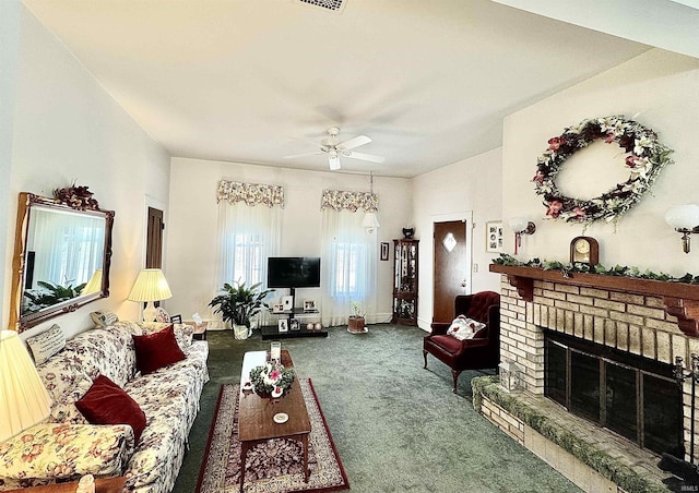 carpeted living area featuring a brick fireplace, visible vents, ceiling fan, and baseboards