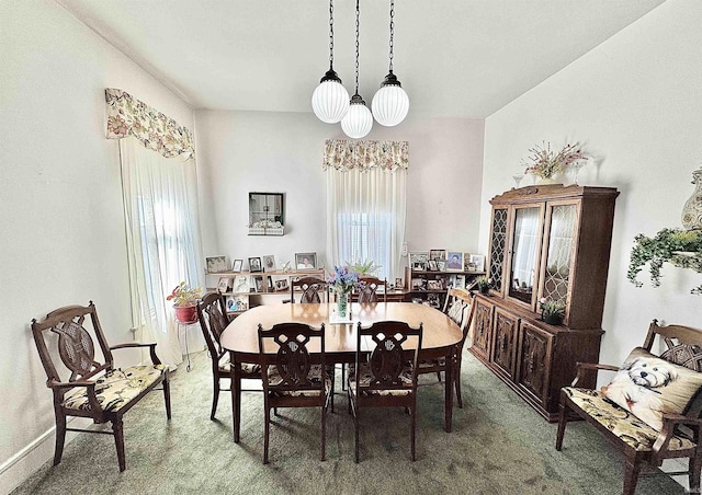 view of carpeted dining space