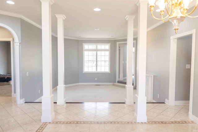 interior space with ornate columns, crown molding, recessed lighting, and baseboards