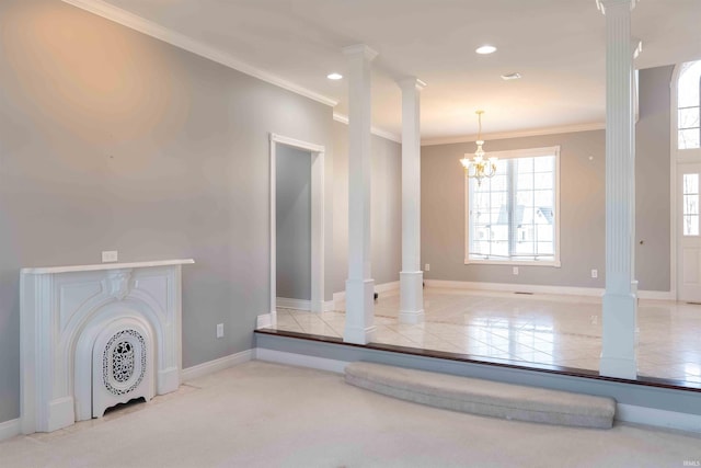 unfurnished living room with ornate columns, ornamental molding, a chandelier, and recessed lighting