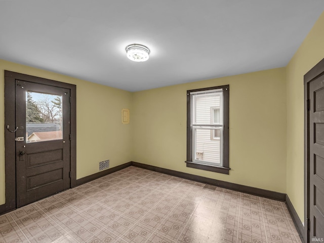 entrance foyer with visible vents, baseboards, and light floors