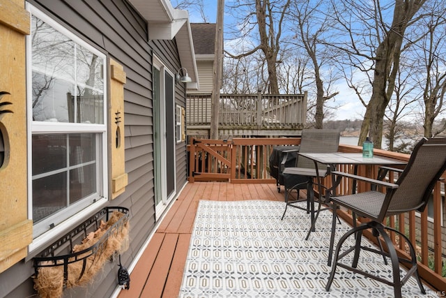 11791 W Pirates Roost Rd, Monticello, IN 47960 - deck with outdoor dining space
