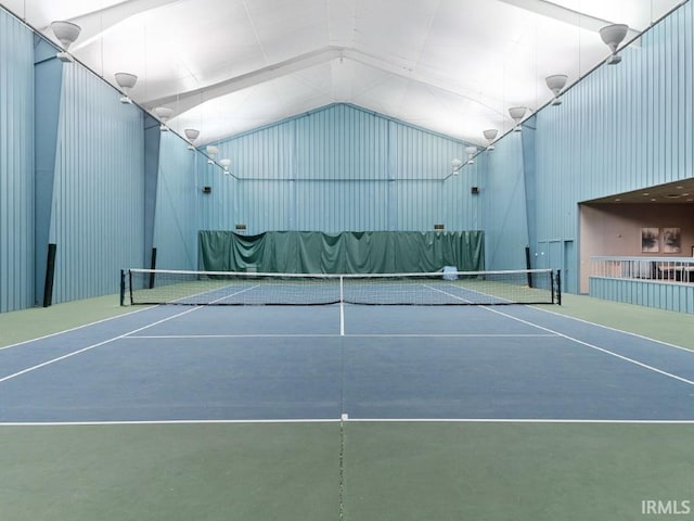 view of sport court featuring fence