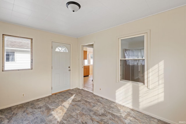 entrance foyer featuring baseboards